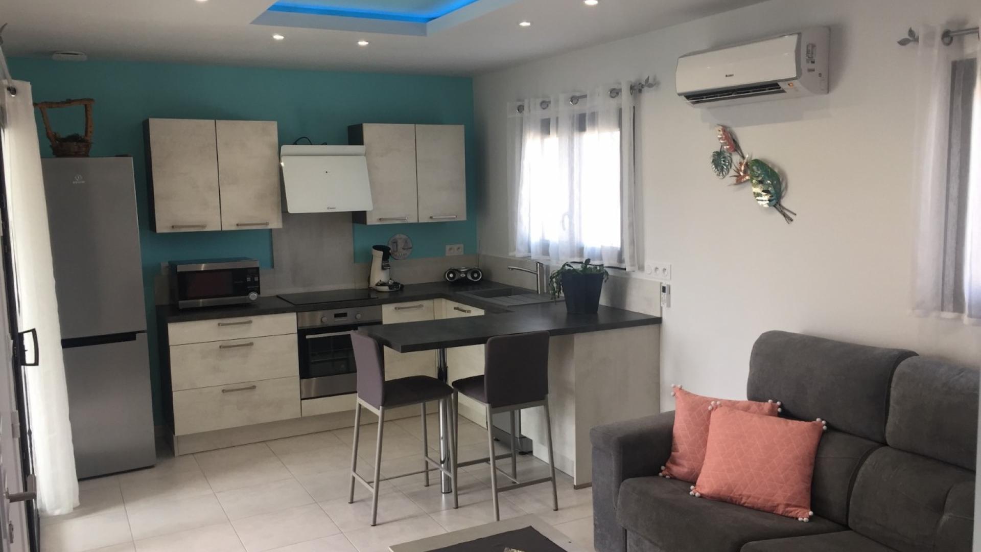 BEL APPARTEMENT DANS VILLA NEUVE T2